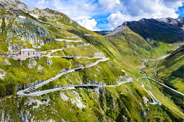 Furka Pass (Switzerland): Begin in Andermatt for a smoother ascent; the opposite side is narrower and steeper, with dramatic glacial scenery and views of the Rhone Glacier.