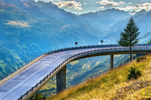 St. Gotthard Pass (Switzerland): Start from Airolo; famous for the cobbled Tremola road, historic tunnels, and mountain inns.