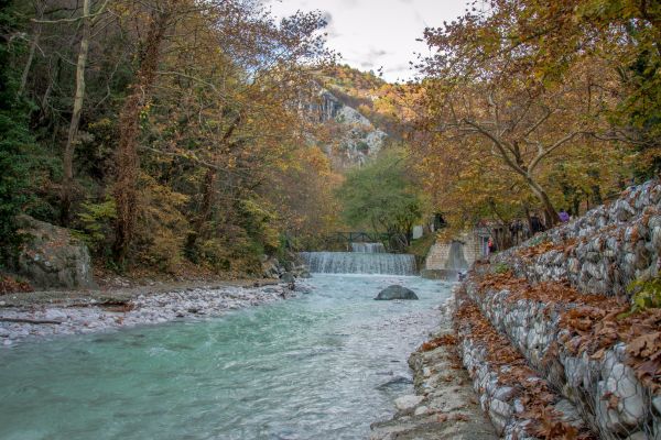 River with colored stones and hot springs in Loutra Pozar