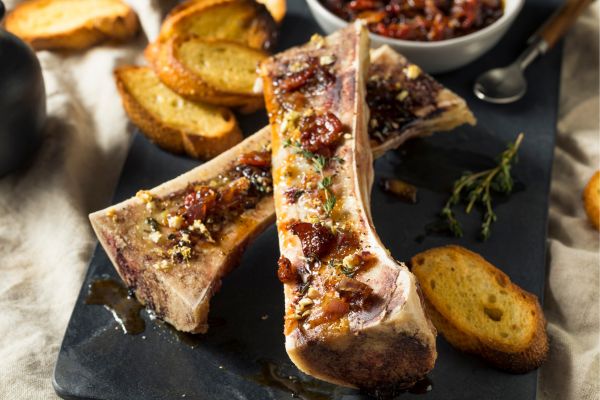 Os à Moelle (Roasted Bone Marrow)): Rich, buttery marrow roasted in the bone, usually served with toasted bread, coarse salt, and parsley; a decadent Lyonnais specialty