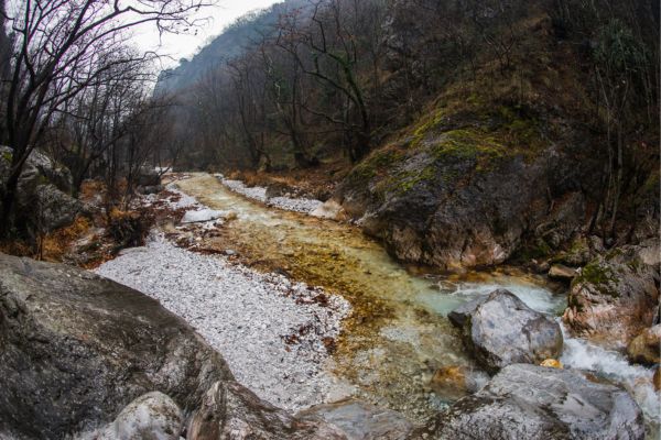River with colored stones and hot springs in Loutra Pozar