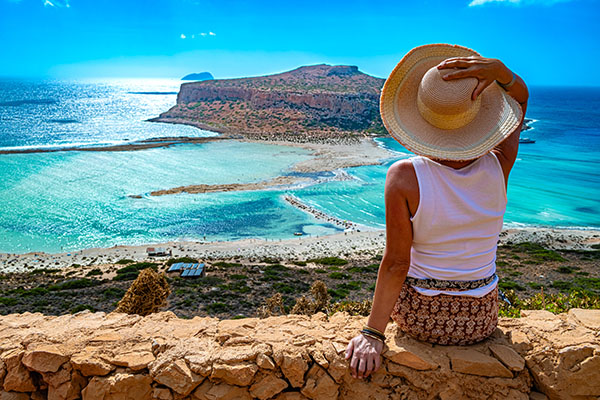 A tourist looking at Balos Lagoon