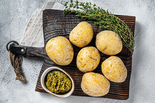 Canary Islands dish Papas Arrugadas, wrinkly potatoes with Mojo verde green sauce