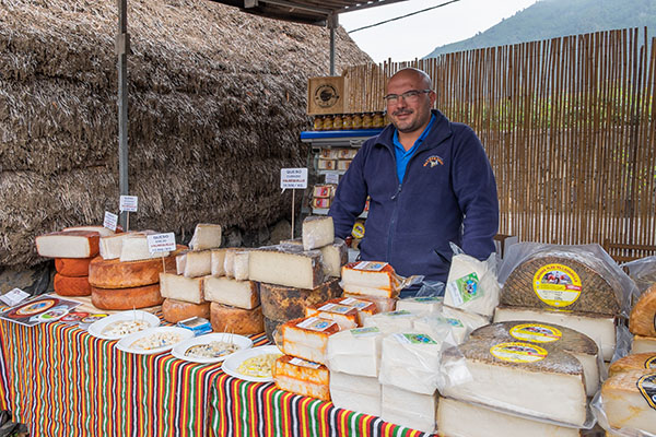 Typical cheeses from the islands in a stand of the Handicraft Fair in the village of Pinolere