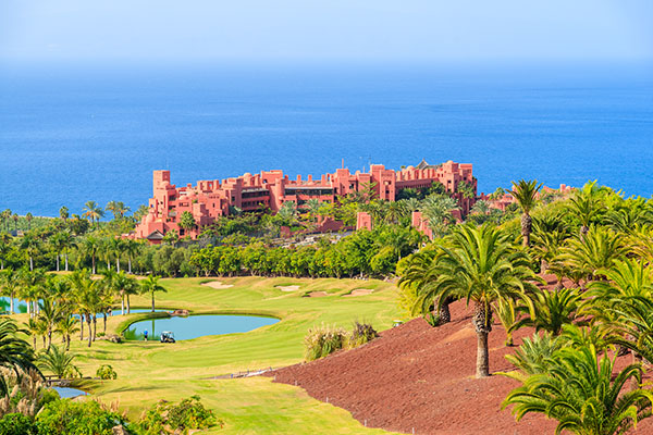 View of Abama hotel and its golf course in tropical landscape near San Juan town, Tenerife
