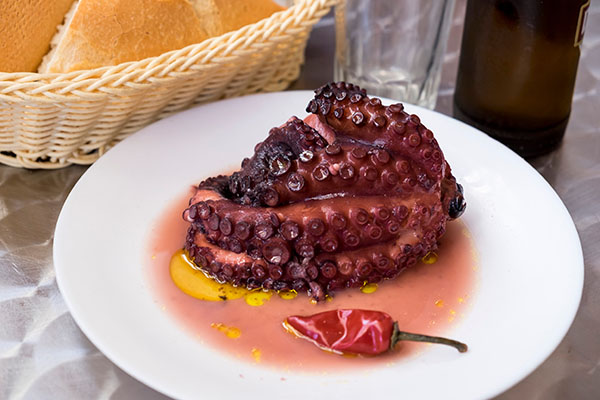 Typical dish of octopus stewed with oil and pepper