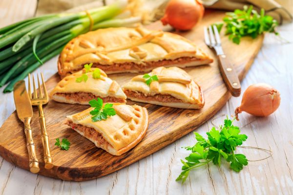 Empanada Gallega: Large savory pies filled with tuna, cod, or meat.