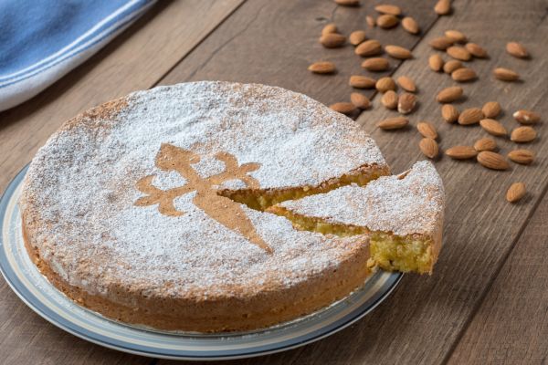 Tarta de Santiago: A dense, flourless almond cake marked with the Cross of Saint James.