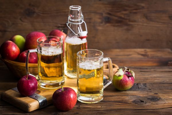 Sidra (Cider): Natural apple cider poured from a height to create bubbles and enhance flavor.