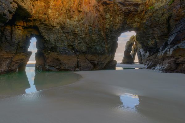 Ribadeo: Cathedrals Beach, one of the most iconic natural wonders in Galicia. They are only accessible for -2 hours before and after low tide. At high tide, they disappear. Access is strictly regulated, permit is required.