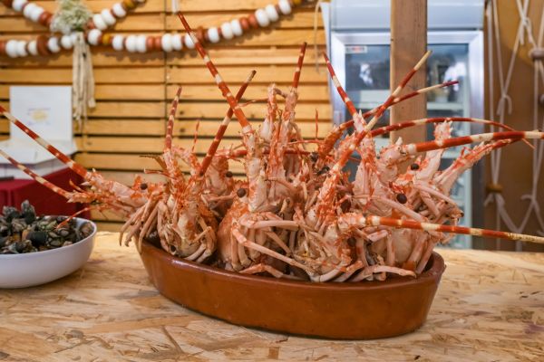 A Guarda, Galicia: Close-up of grilled fresh spiny lobsters served at the traditional Lobster Festival.